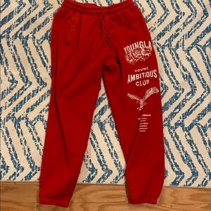 69. Men’s Size Large YOUNGLA Red Sweatpants